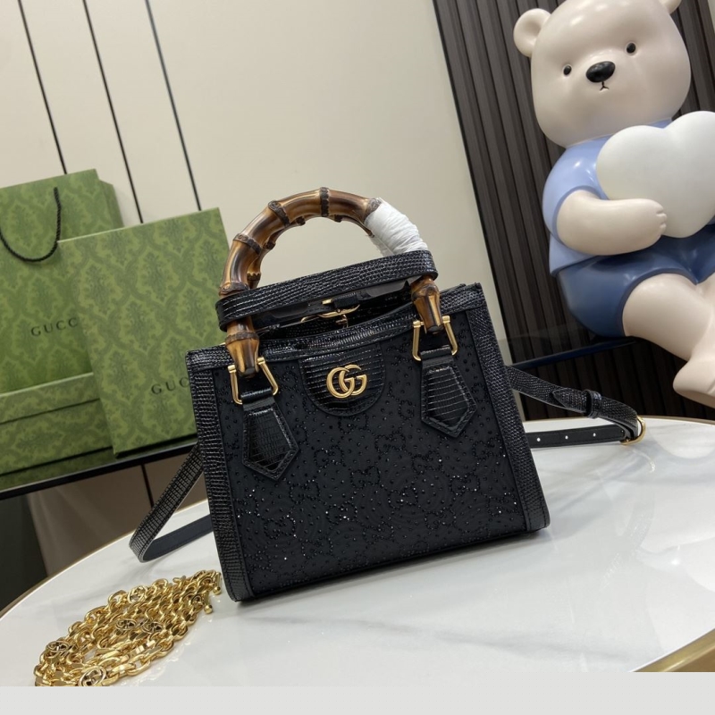 G*u*i top handle bags